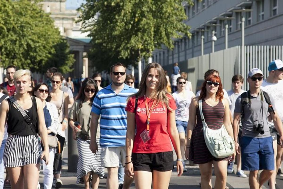 a group of people walking down a street