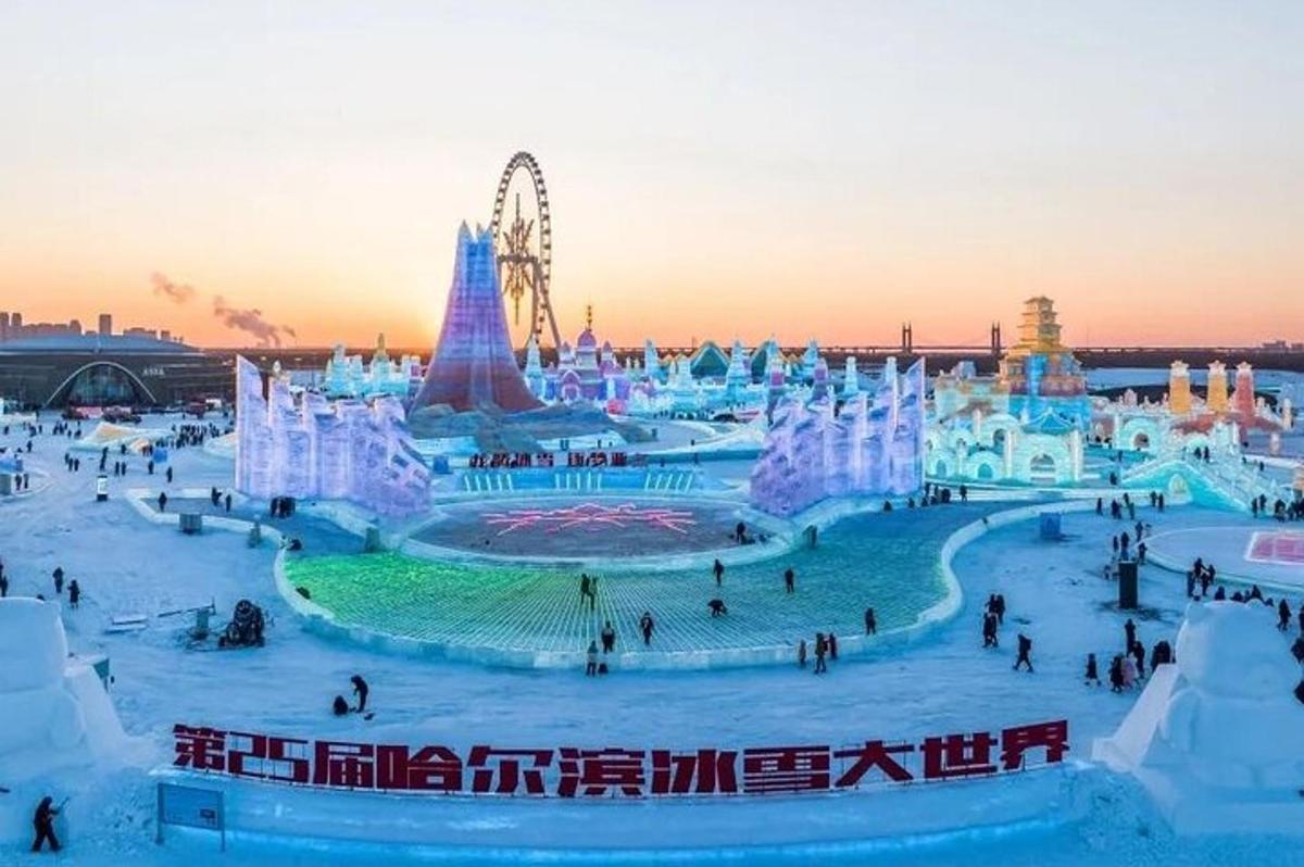 an ice festival with a ferris wheel in the background