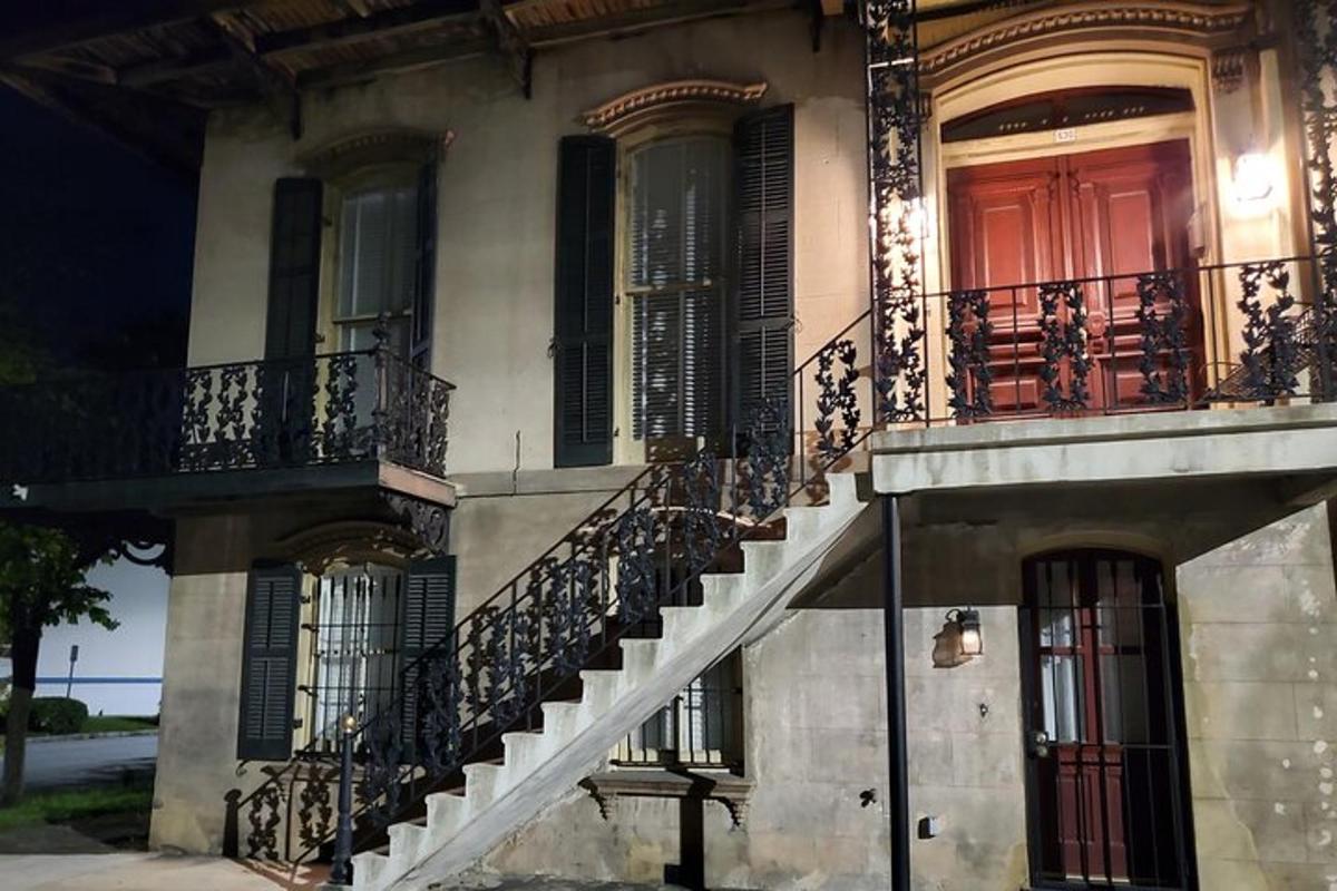 a building with balconies and a staircase on it