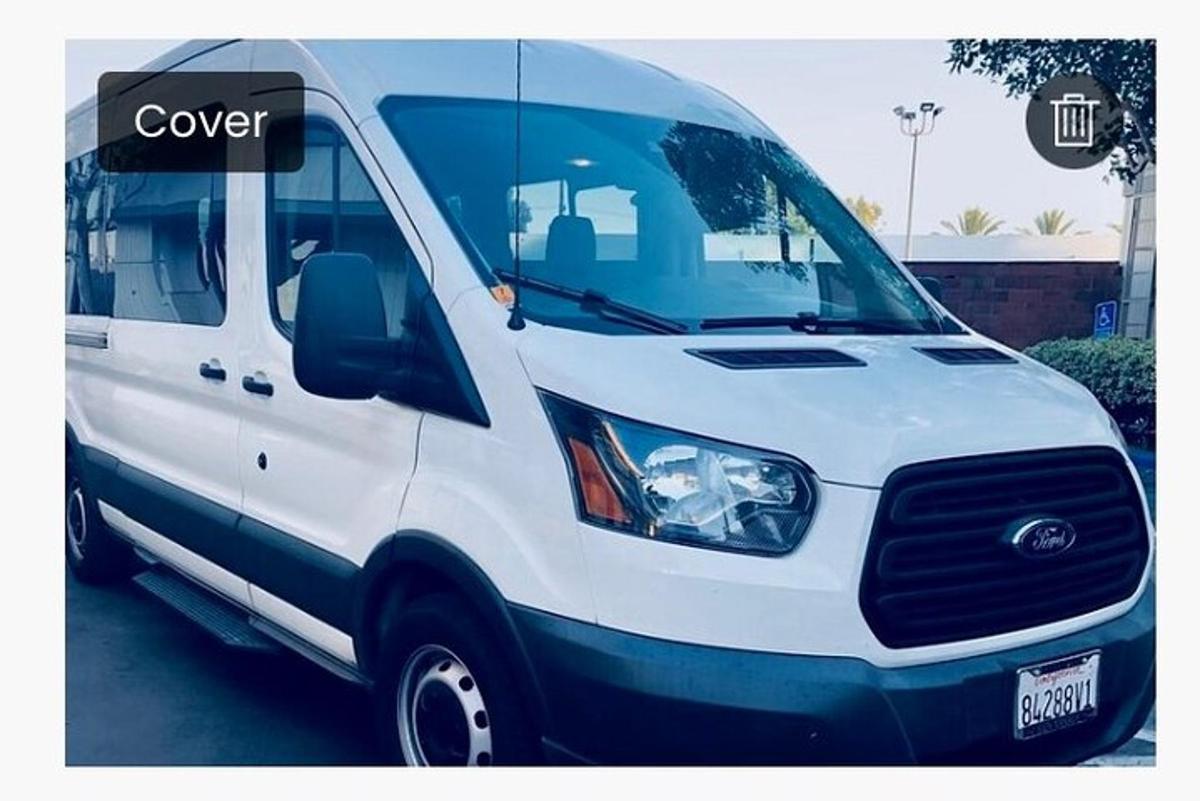 a white van parked in a parking lot