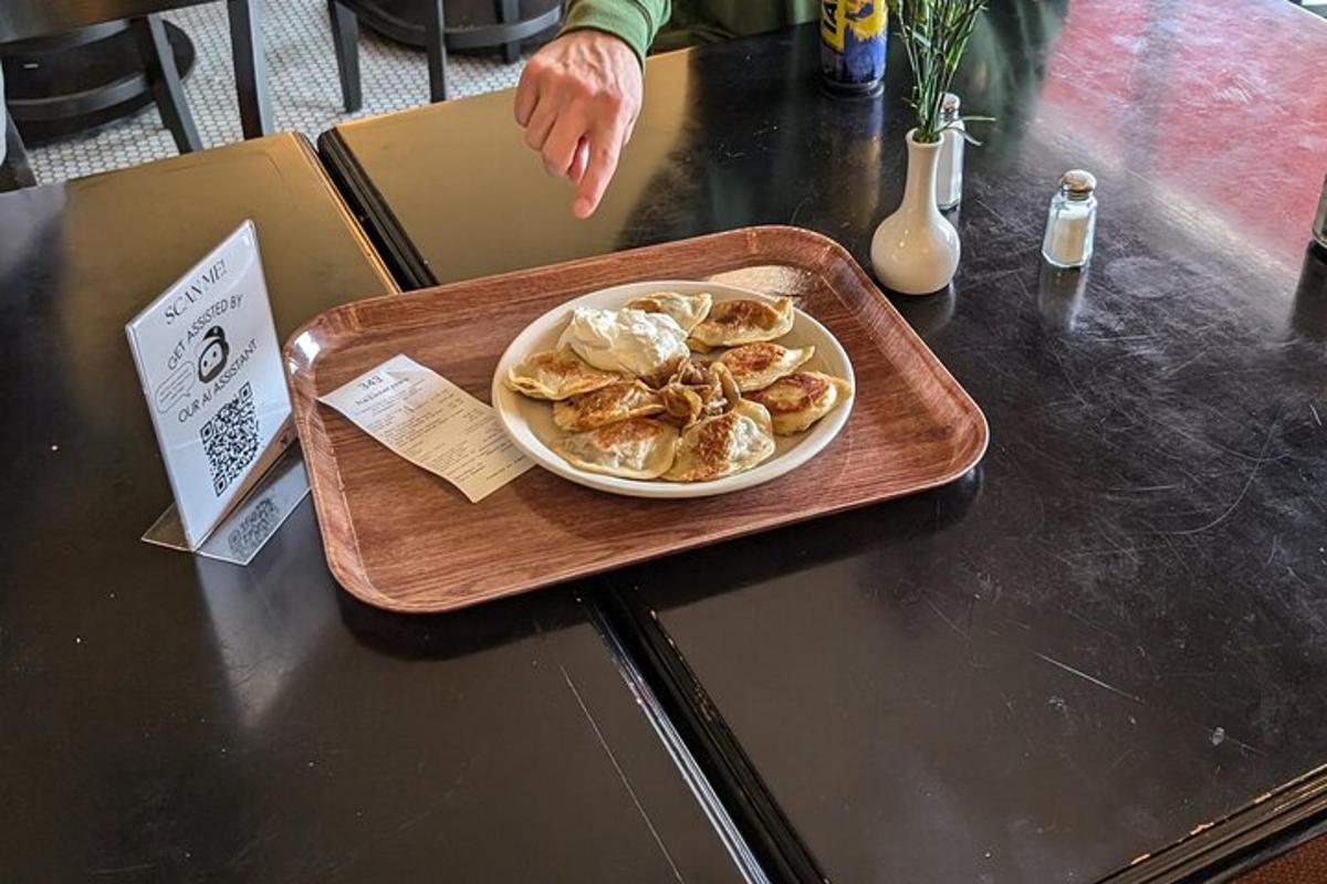 a plate of food on a tray on a table
