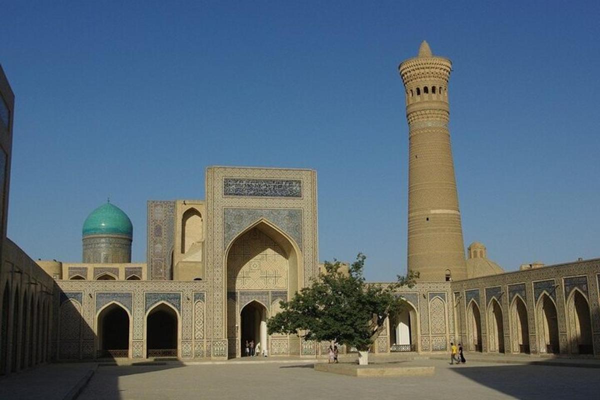 a large building with a tower and a mosque