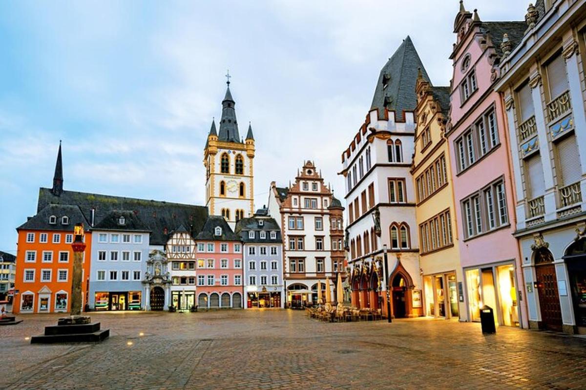 a city street with buildings and a clock tower