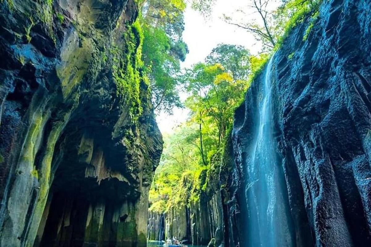 a waterfall on the side of a mountain