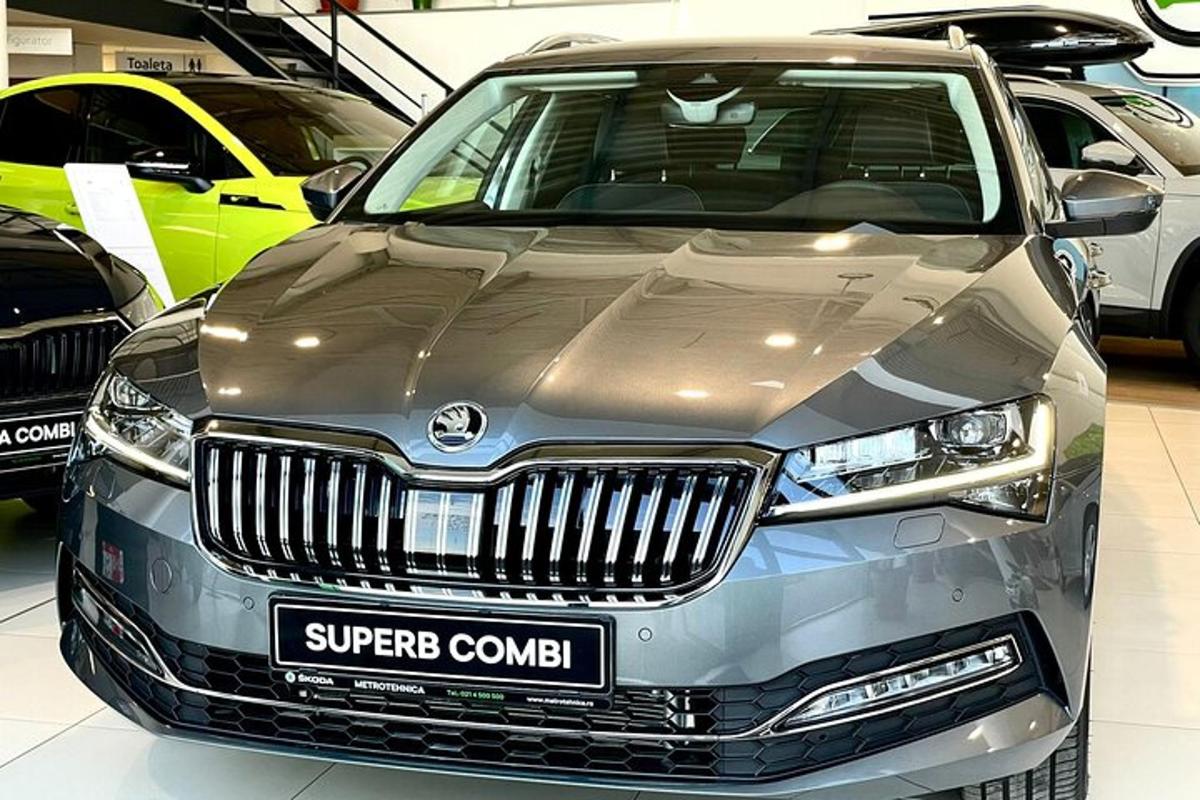 a silver car is parked in a garage