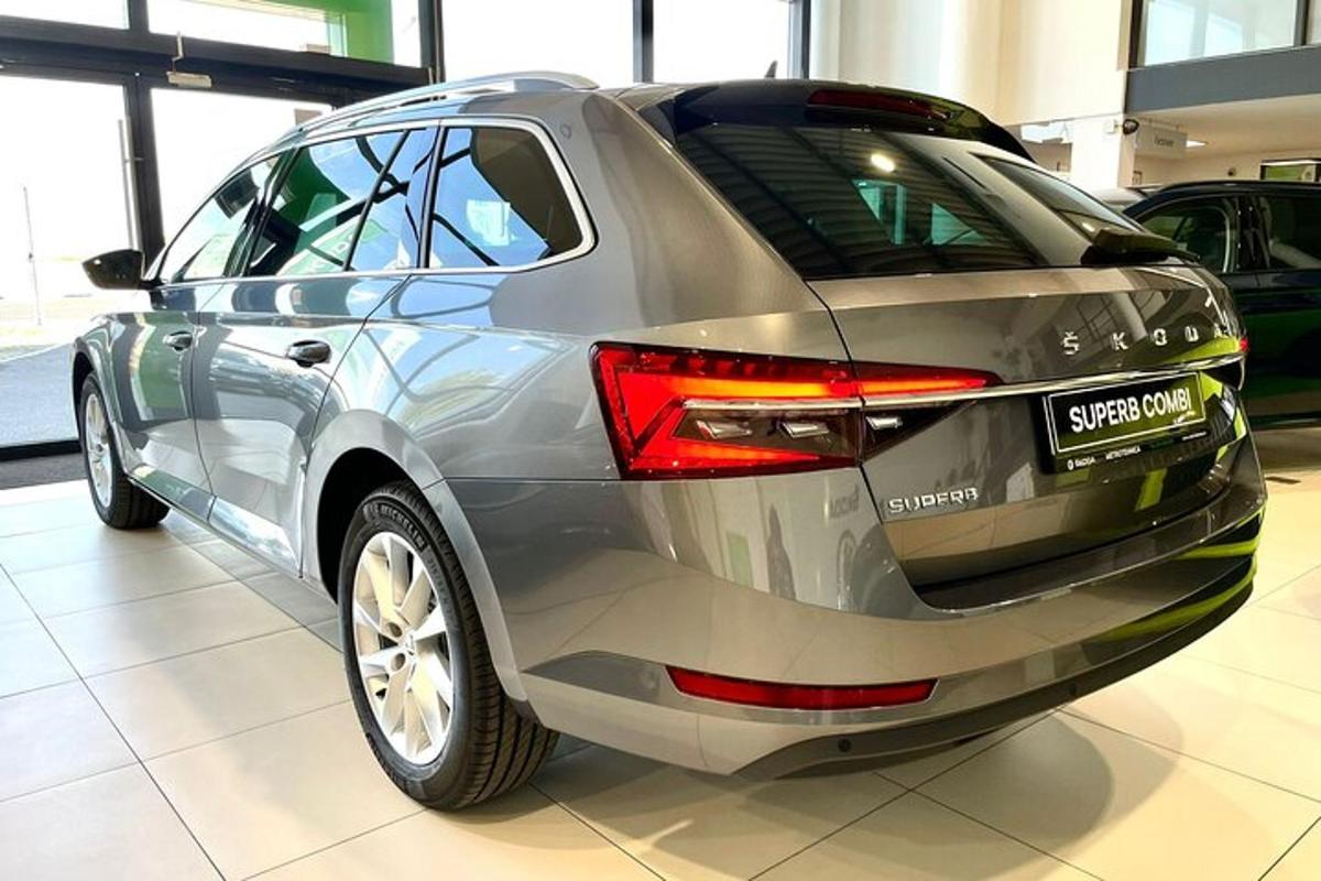 a silver car is parked in a building