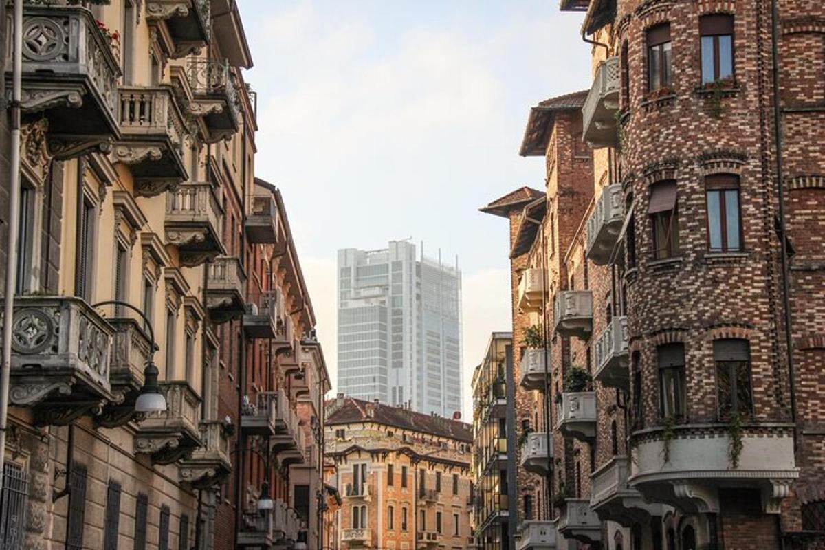 a city street with tall buildings and a skyscraper