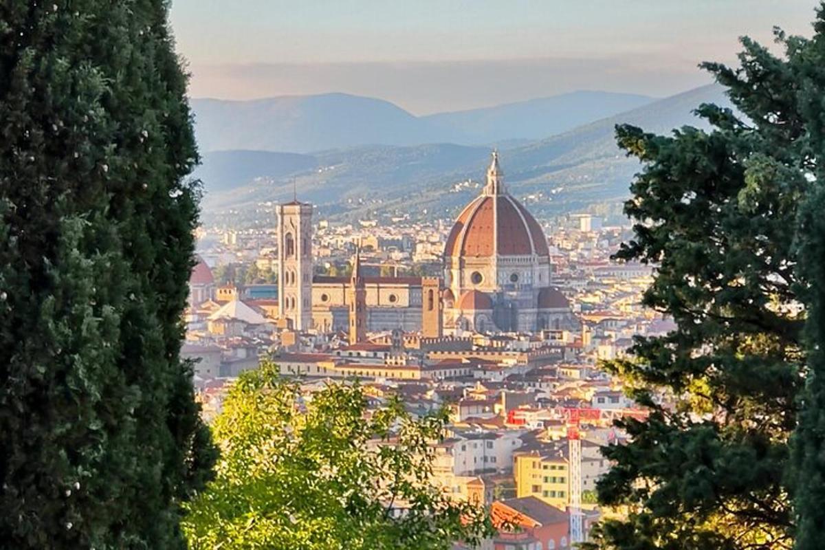 a view of a city with a mosque and buildings