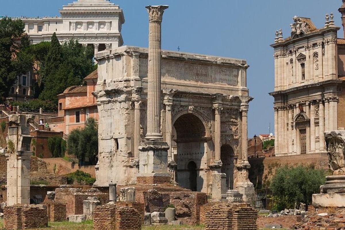 an ancient building with a column in front of a building
