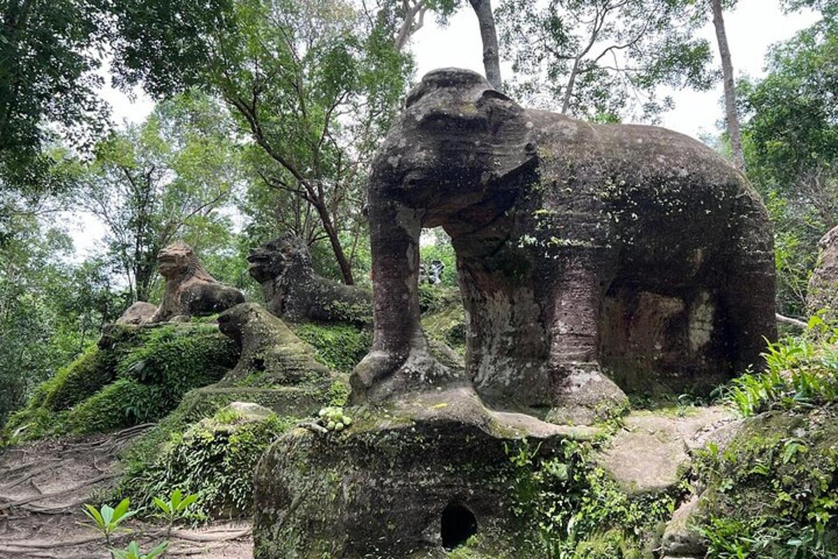 a statue of an elephant on top of a hill
