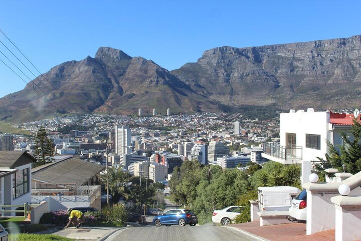 a view of a city with a mountain in the background