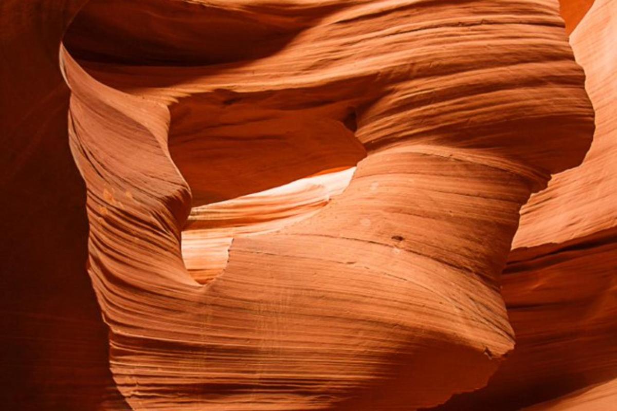 a view of a slot canyon with a rock formation