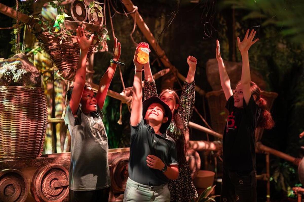 a group of people raising their hands in the air