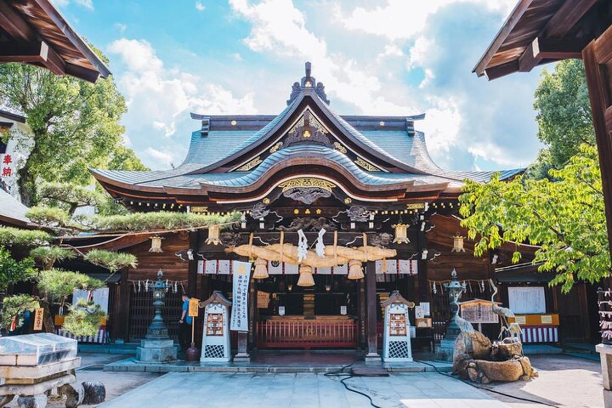a temple with a building with a roof