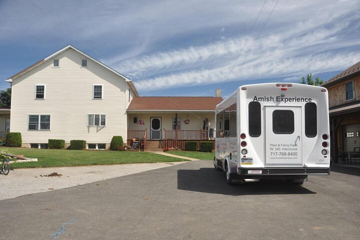 a white truck parked in front of a house