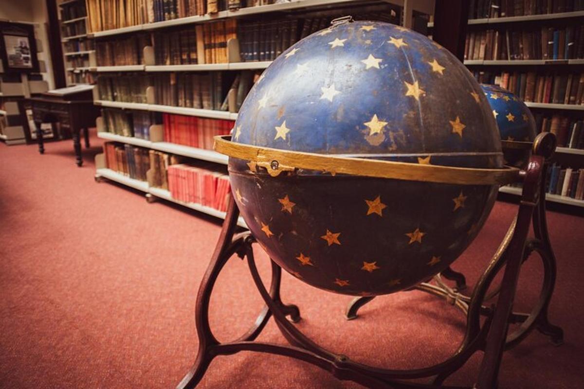 a blue ball with stars on it in a library