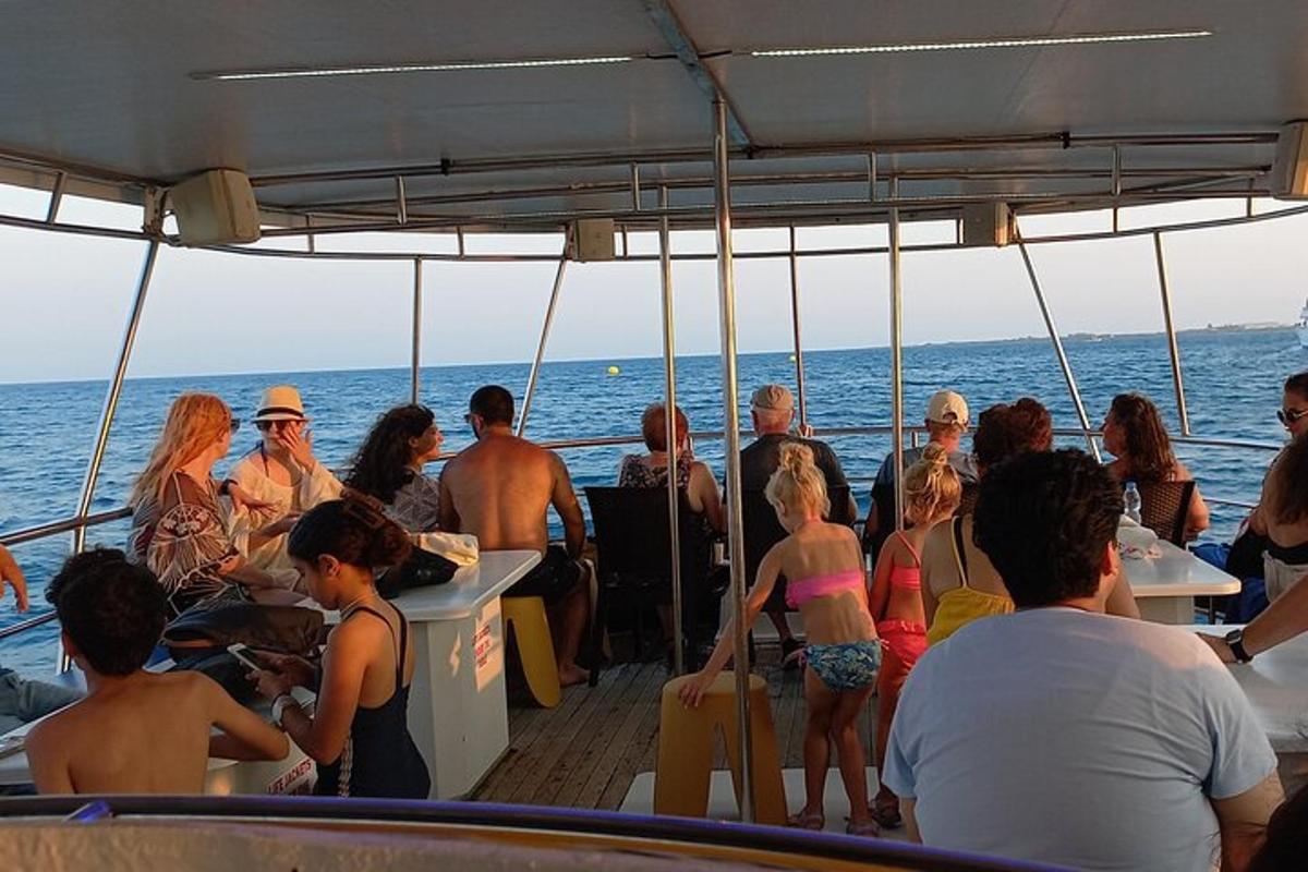 a group of people on a boat in the water
