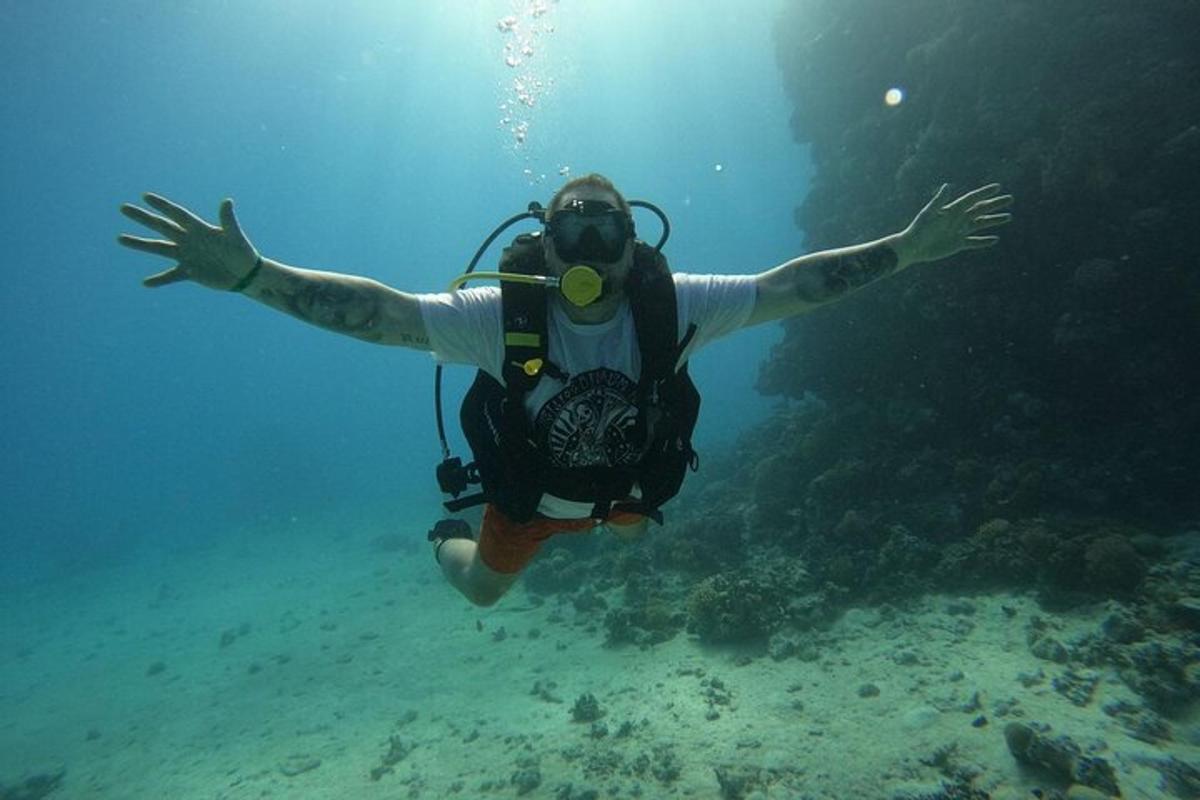 a man is swimming in the water in the ocean