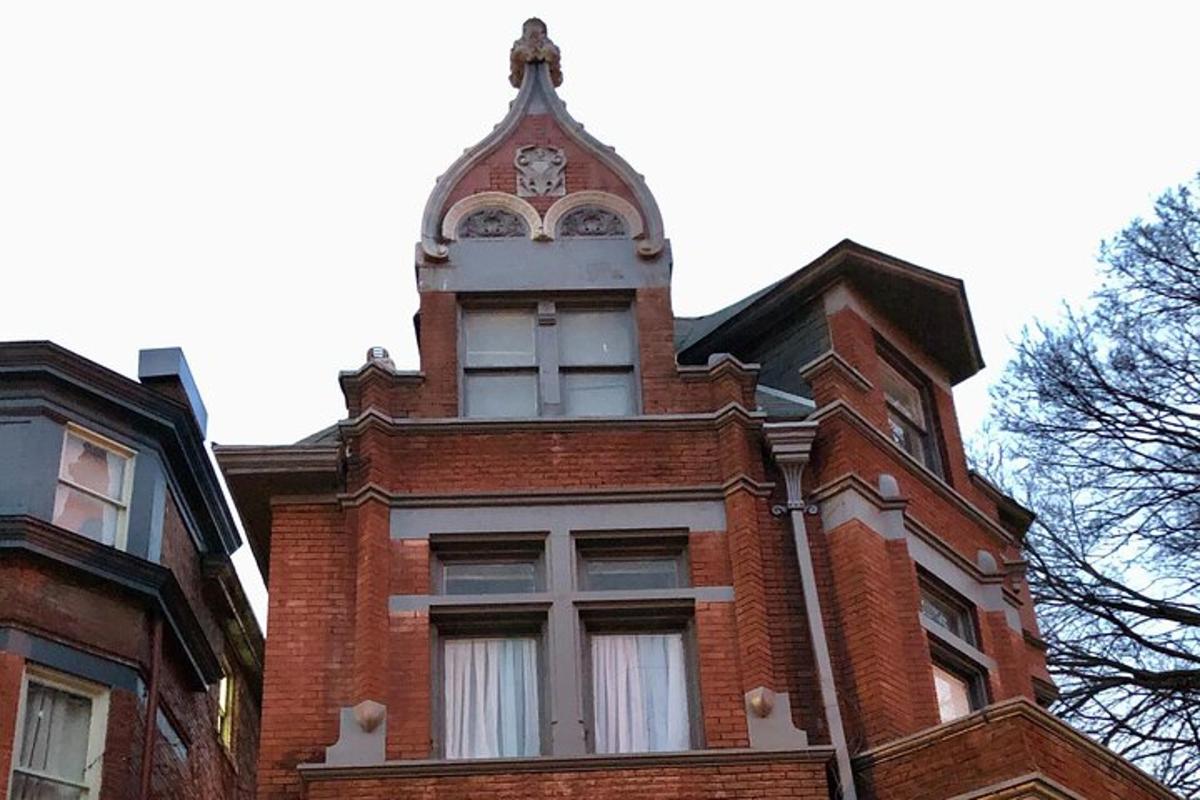 a brick building with a clock tower on top of it