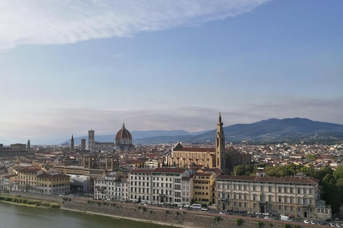a view of a city with a river and buildings