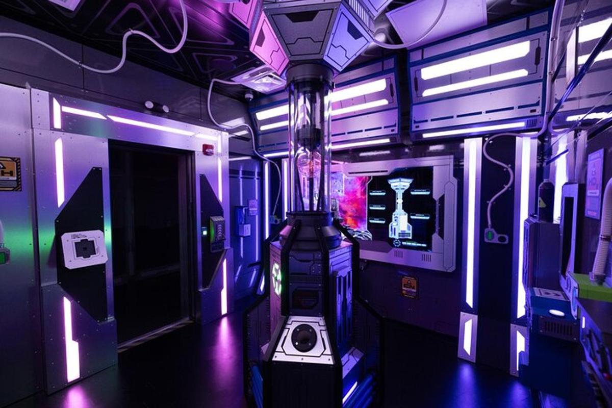 a room with purple and purple lights on a train
