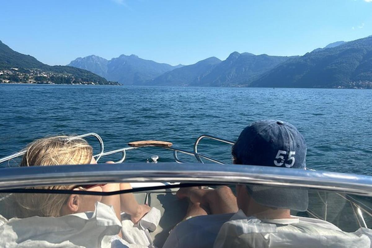 a group of people on a boat in the water