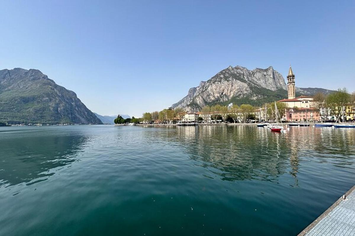 a view of a body of water with mountains in the background