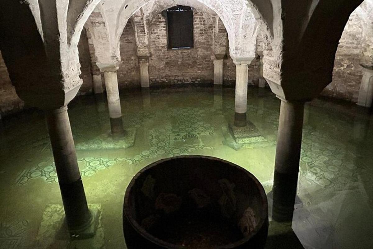 a room with a pool of water in a building