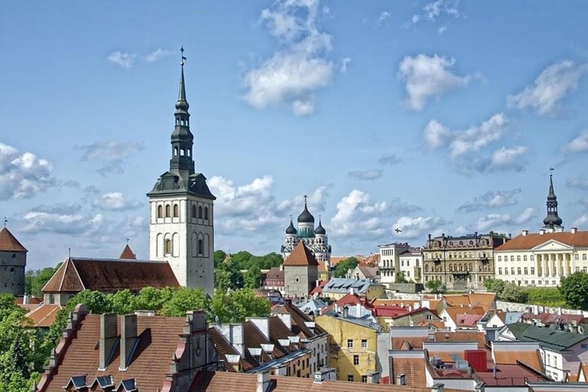 a view of a city with buildings and a tower