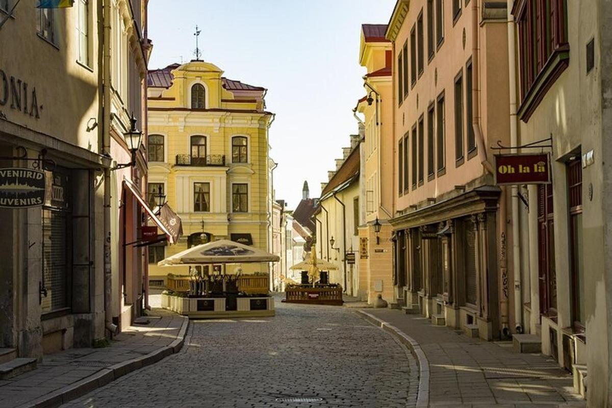 an empty street in a city with a trolley
