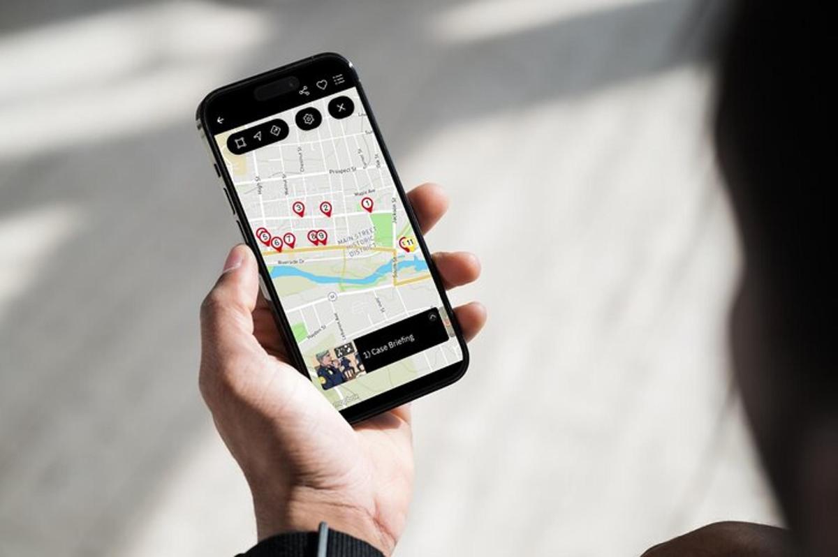 a person holding a cell phone in their hand