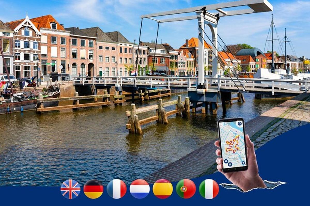 een hand die een mobiele telefoon vasthoudt voor een jachthaven