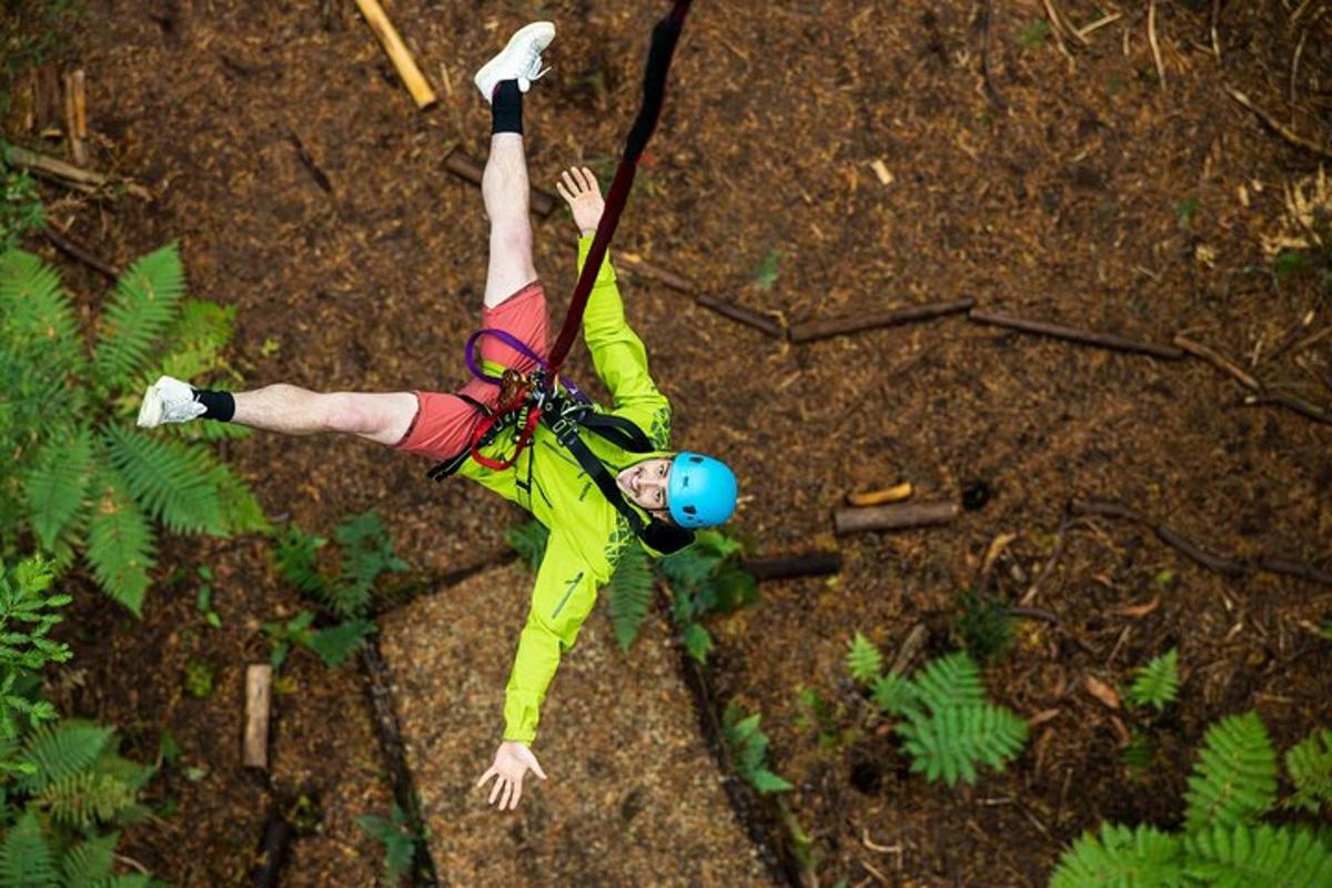 a person is on the ground with their hand in the air