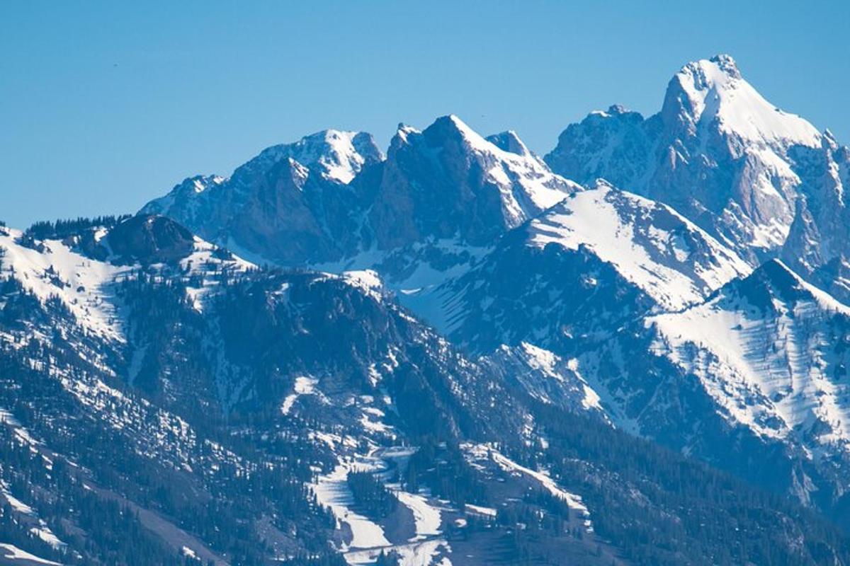 a mountain range with snow on the top of it