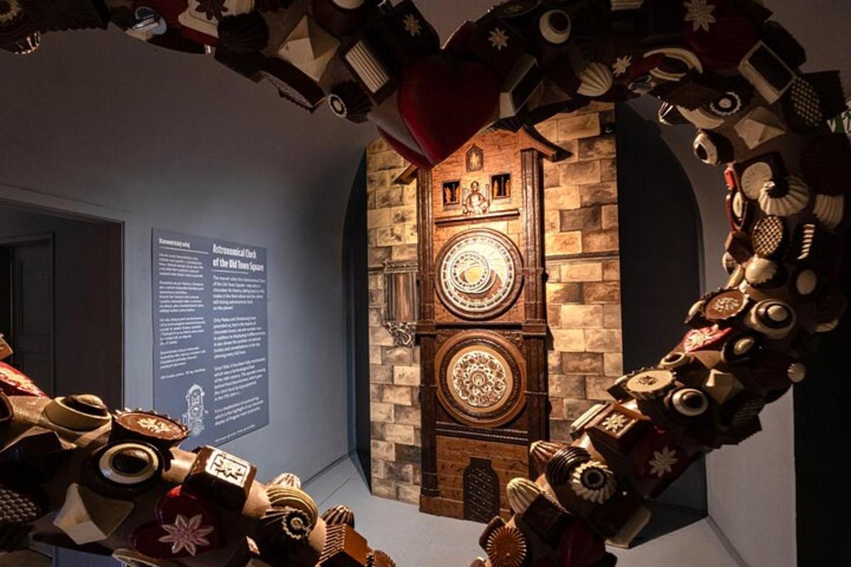 a large wooden grandfather clock in a museum exhibit