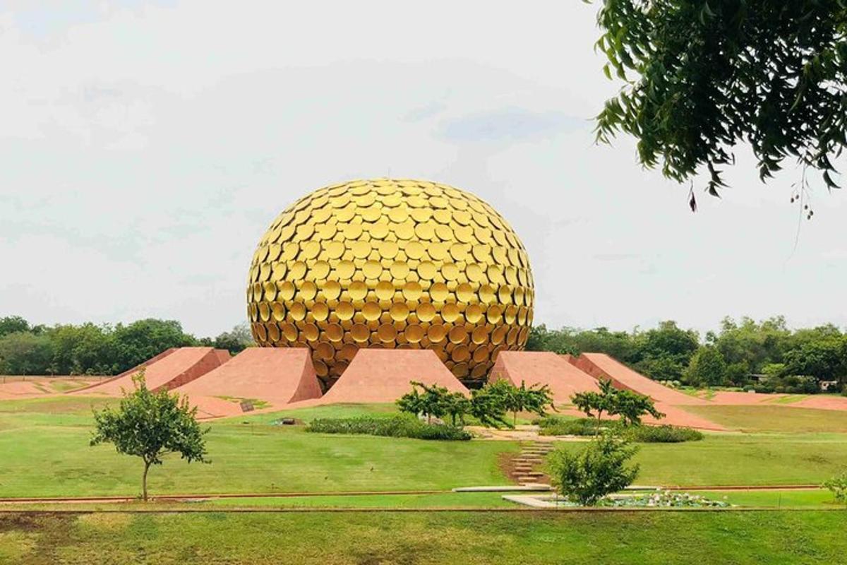 a rendering of a large gold object in a field