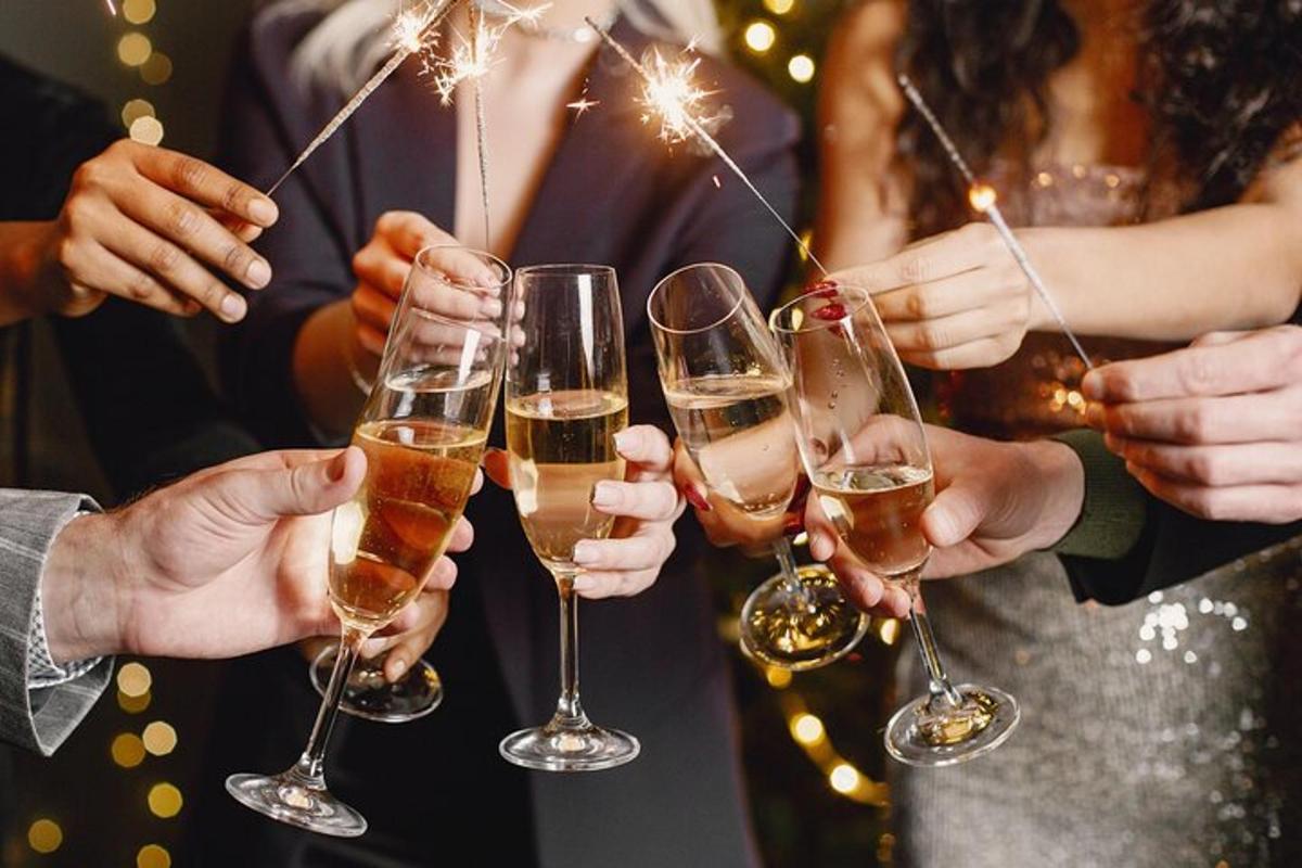 a group of people holding glasses of champagne