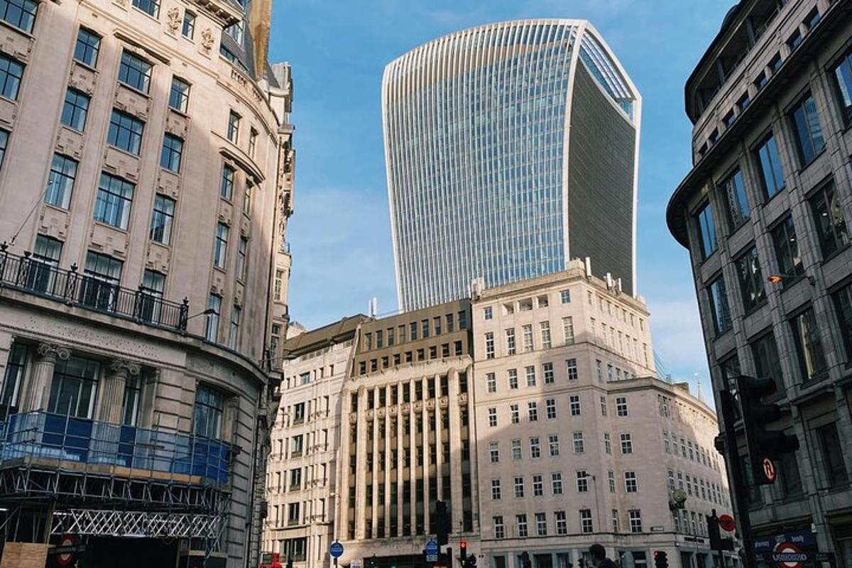 a group of buildings in a city with a tall skyscraper