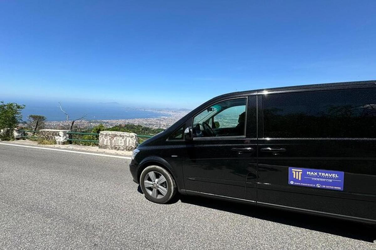 a black van parked on the side of a road