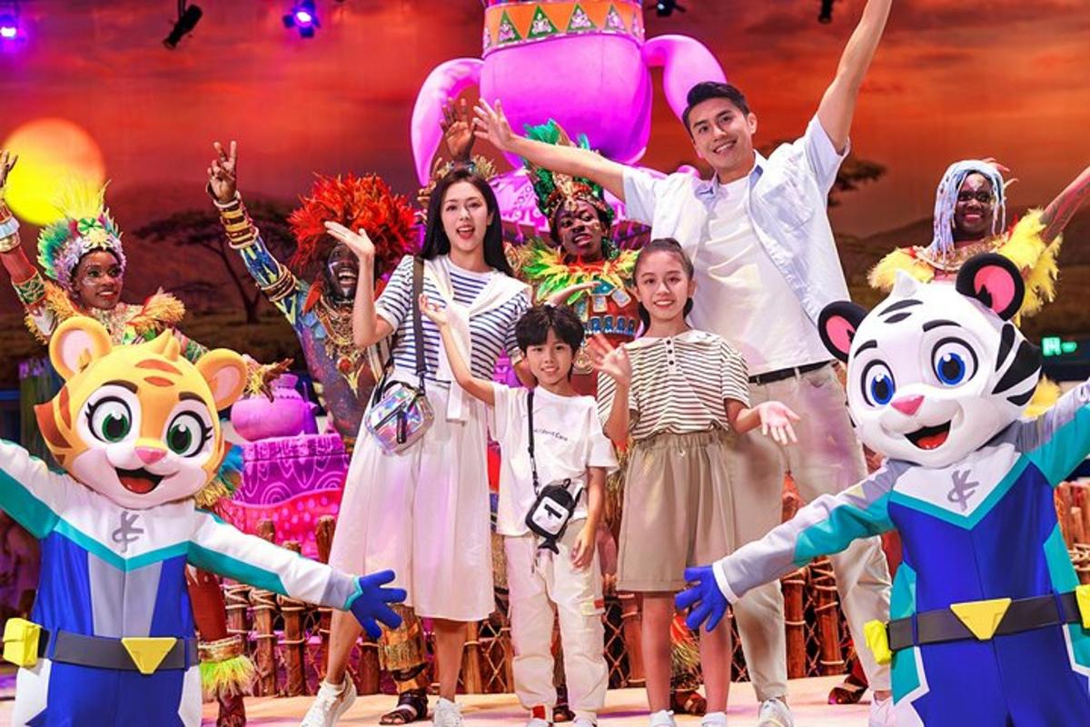 a group of people on a stage with mascots