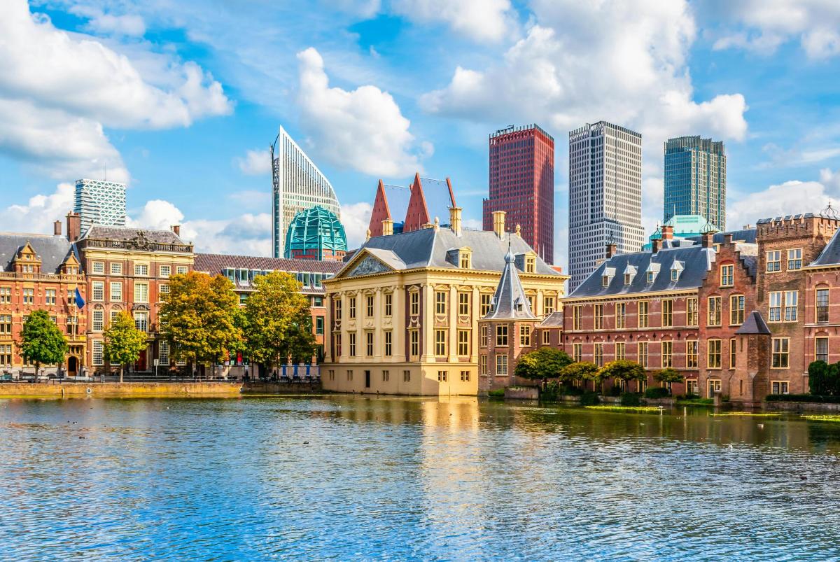 a view of a city with a river and buildings
