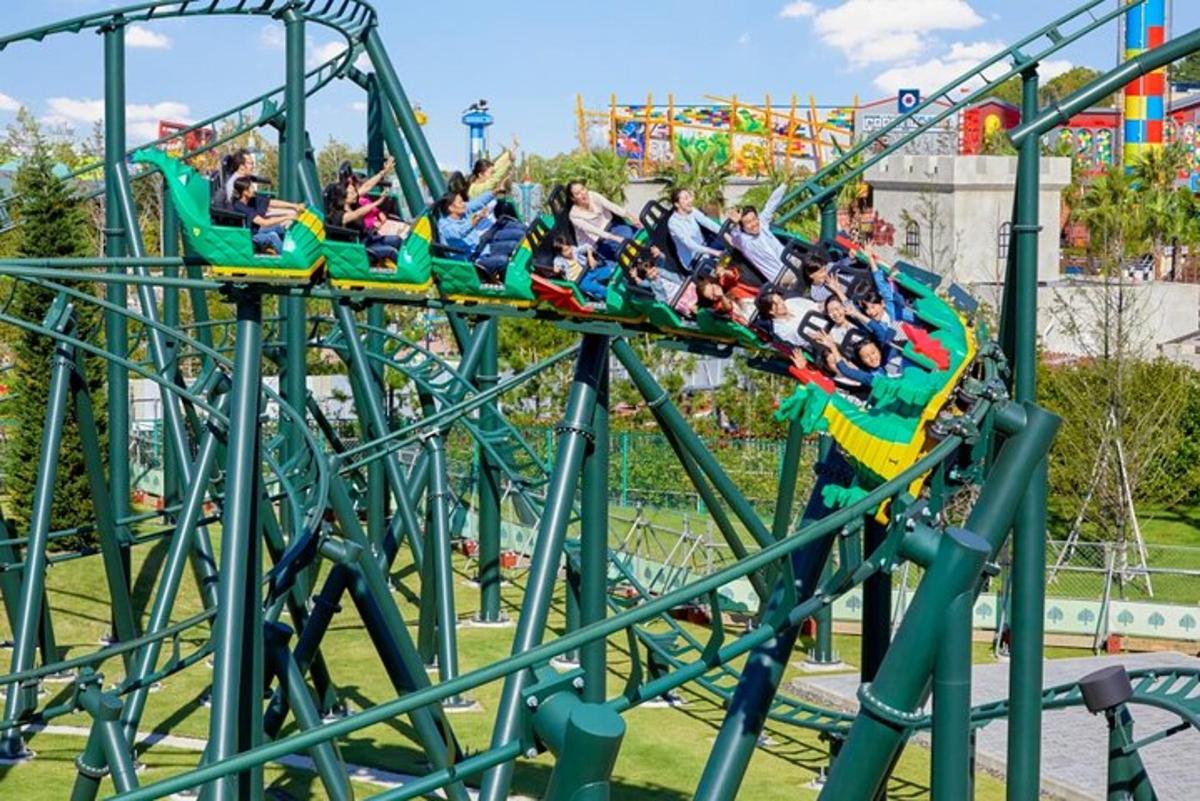 a group of people riding on a roller coaster