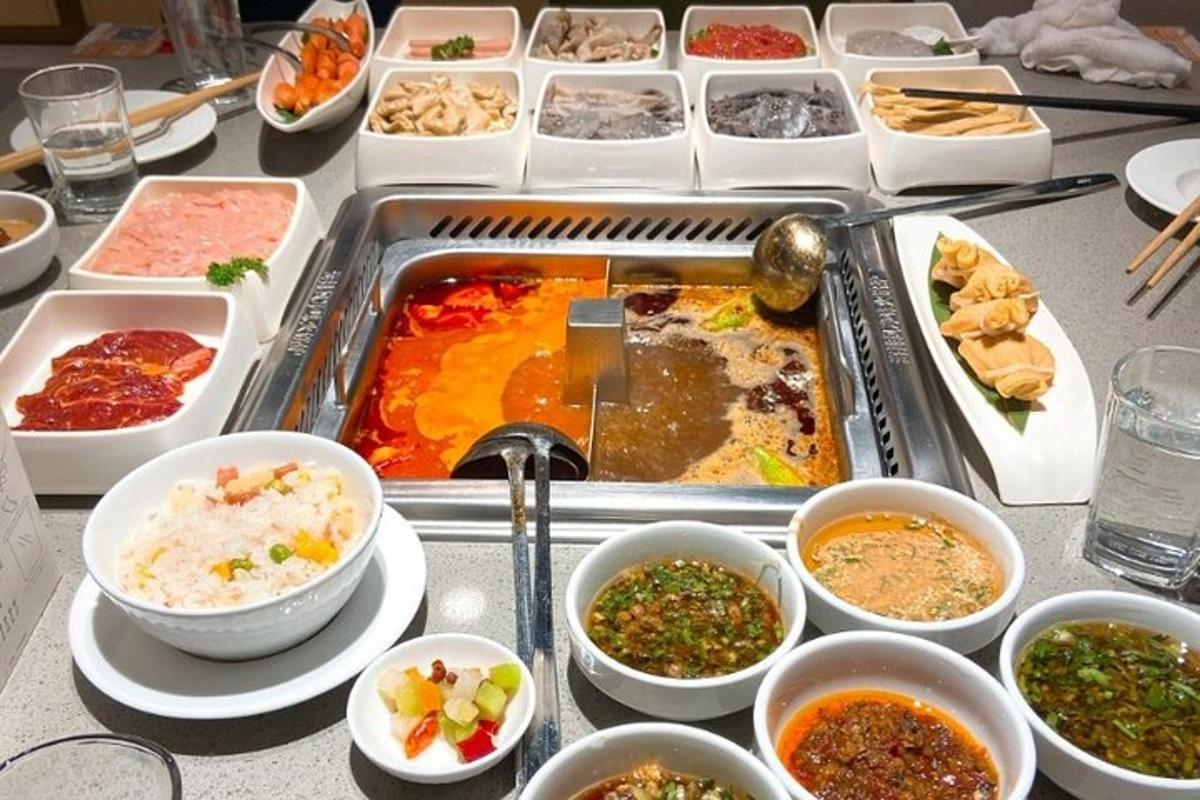 a table topped with bowls of different types of food