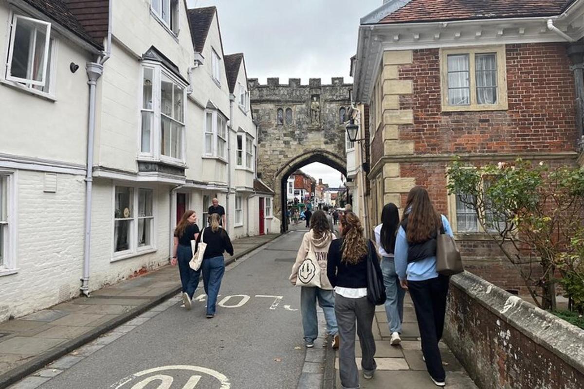 a group of people walking down a street