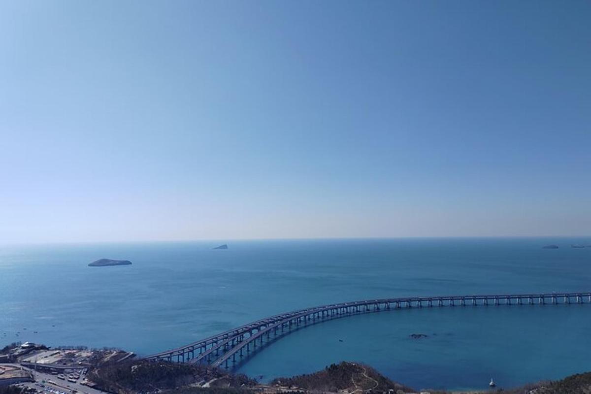 an aerial view of a bridge over the water