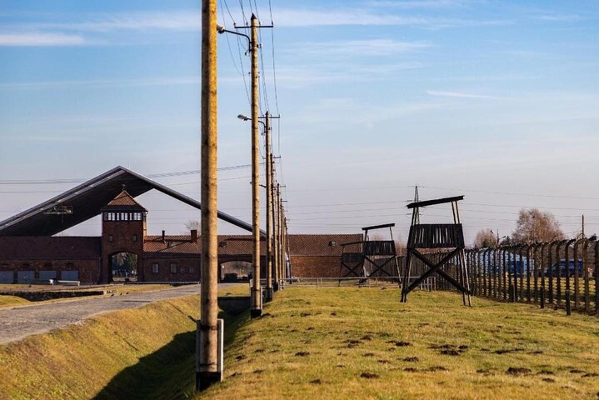 an empty playground in a field next to a building
