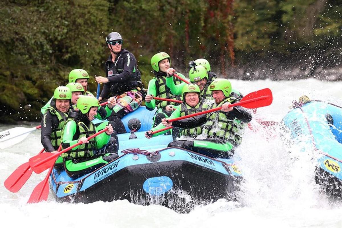 a group of people on a raft in the snow