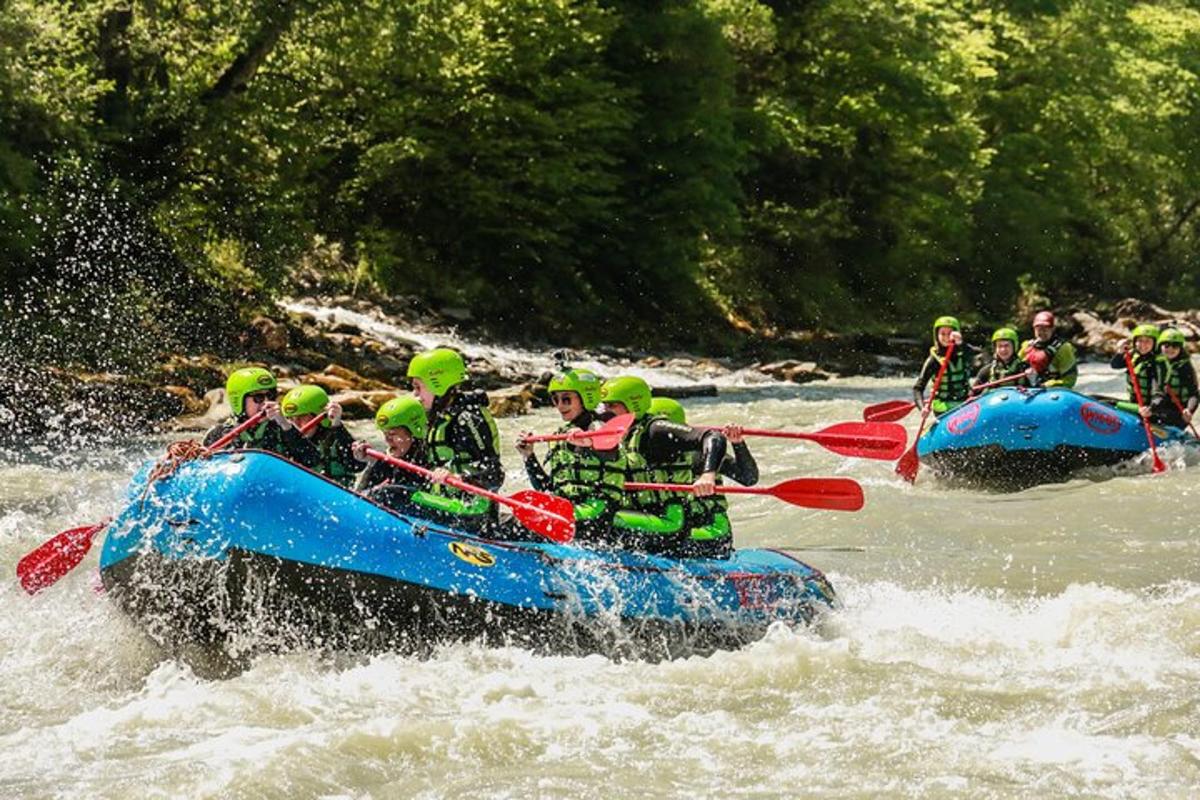 a group of people are rafting on a river