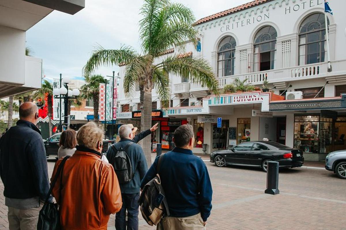 a group of people standing on a city street