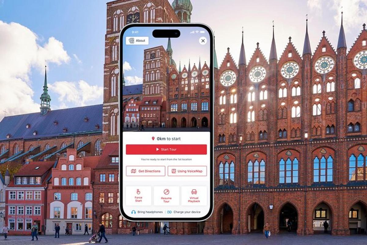 an iphone in front of a large building